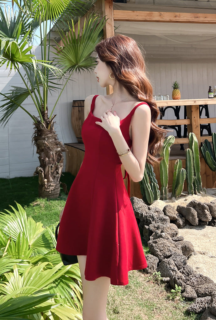 Midnight Romance Fit And Flare Mini-Bow Back Cocktail Dress
