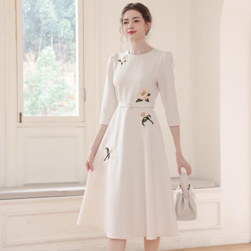 Vintage-Style Cream Belted Dress with Floral Accents