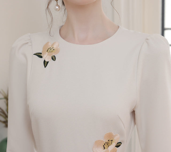 Vintage-Style Cream Belted Dress with Floral Accents