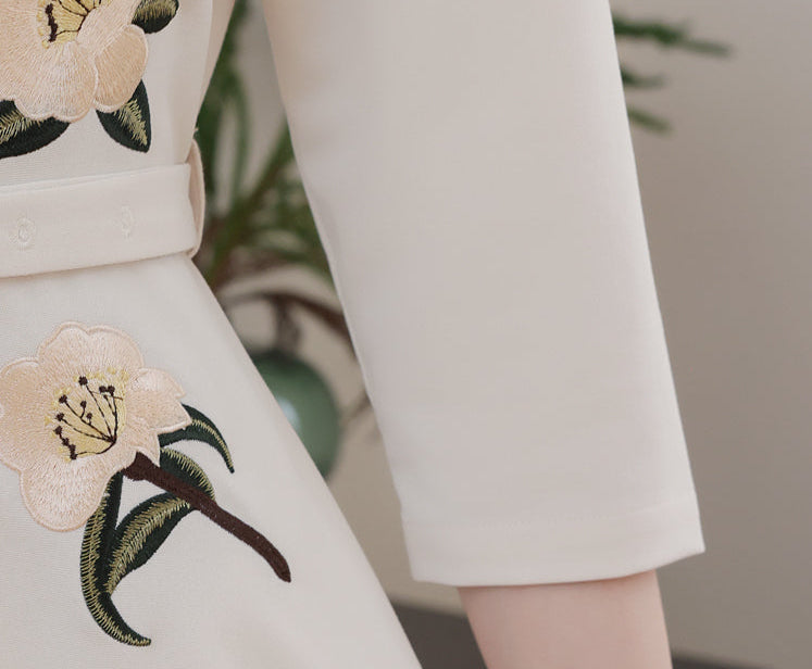 Vintage-Style Cream Belted Dress with Floral Accents