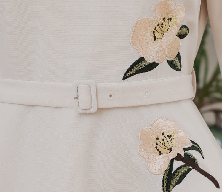 Vintage-Style Cream Belted Dress with Floral Accents