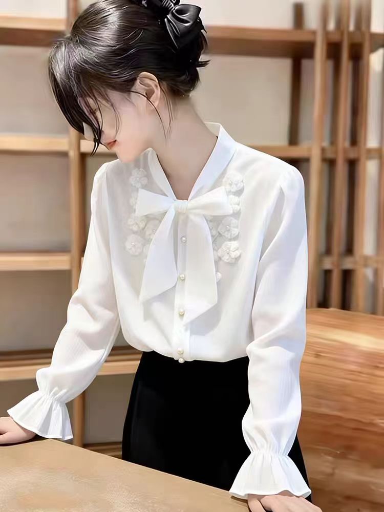 Ethereal White Ruffle-Cuff Blouse With Floral Embroidery